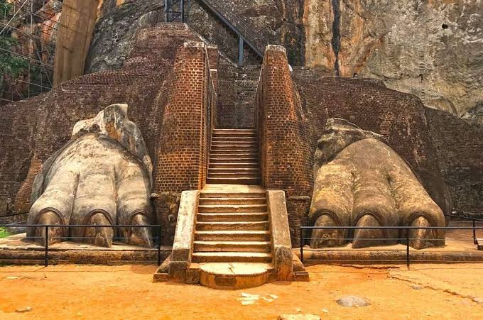 Ancient Lion’s Paw staircase entrance at Sigiriya rock fortress in Sri Lanka.